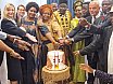 Celebrating tradition: Cutting the cake at the Olubugo launch - Launch of Barkcloth (Olubugo) Use in the UK – March 2025