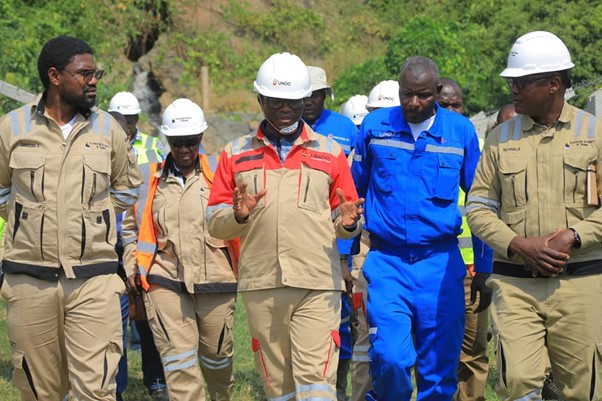 The Katikkiro touring the Kingfisher oil well Image