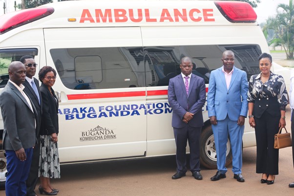 Hon. Nakate with officials from the Kabaka Foundation receiving the ambulance from Buganda Kombucha Image