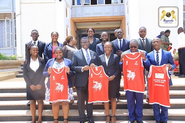 The Katikkiro handed over birthday run kits to the students. Image