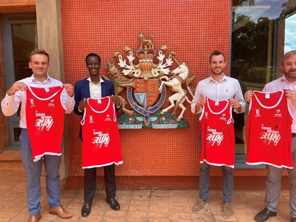 Some of the employees were holding their shirts Image