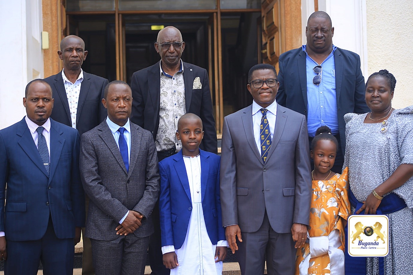 The Katikkiro with coffee farmers from Busiro county in a group photo Image
