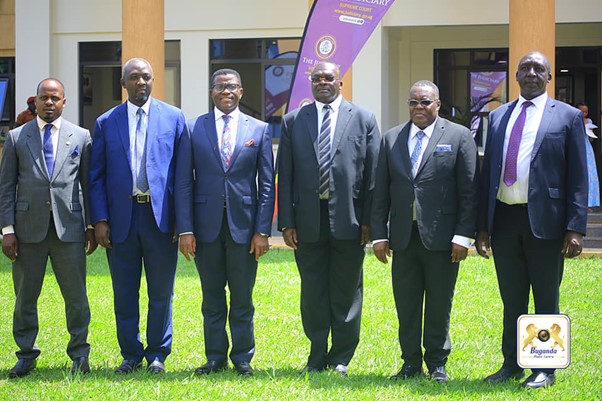 Katikkiro and the chief justice with his team and ministers from Mengo Image