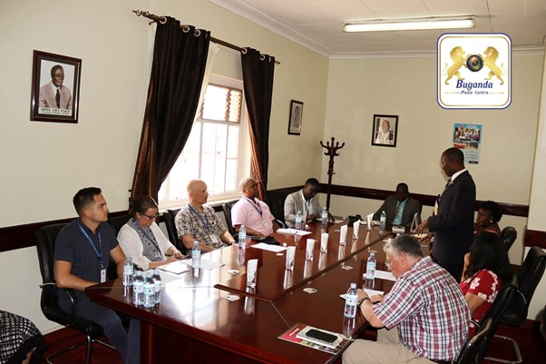 The delegation having an interaction with Minister Noah Kyimbaon on behalf of the Katikkiro Image