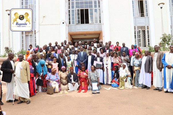 Minister Noah Kiyimba in a group photo with leaders from Buddu County Image