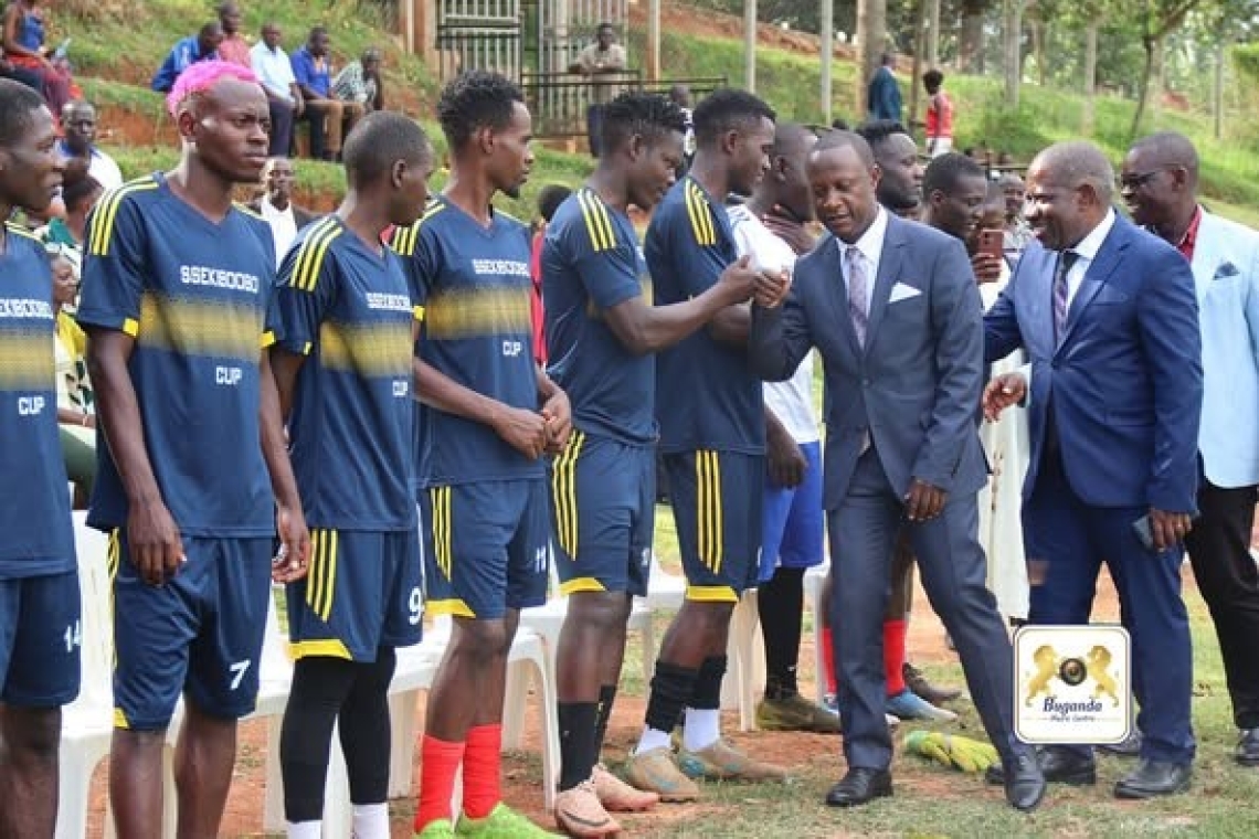 Hon. Robert Serwanga Ssalongo greets the players alongside the Kyaggwe County Chief Image