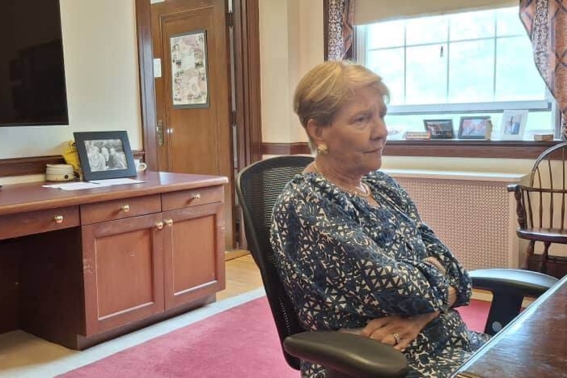 Regis College President, Antoinette M. Hays, after meeting officials from the Buganda Kingdom Regis College President, Antoinette M. Hays, after meeting officials from the Buganda Kingdom