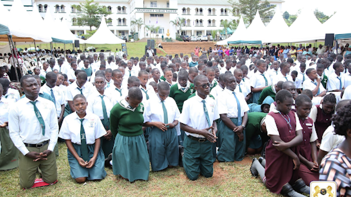 Students being prayed for during the dedication service
