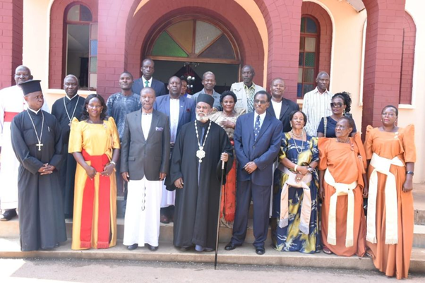 The Hon. Patrick Luwaga, Oweek Mulwanyamuli and Archbishop Jeronymos, and other officials Image