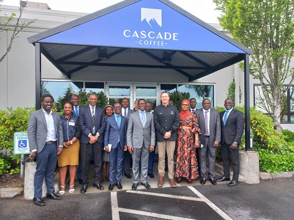 The Katikkiro and his team tour the CASCADE coffee company. Image