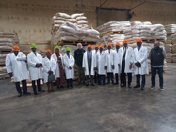 The Katikkiro and his team tour the CASCADE coffee company. Image