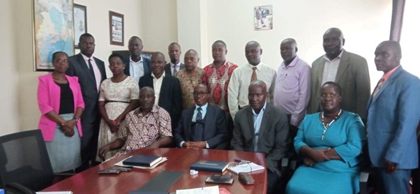 Hon. Joseph Kawuki is seated second on the left with the judicial council. Image