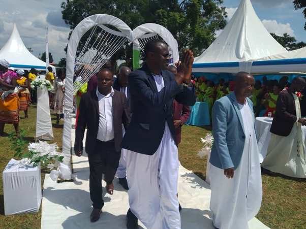 Omutaka Namwama, Augustine Kizito Mutumba arriving at the function. Image