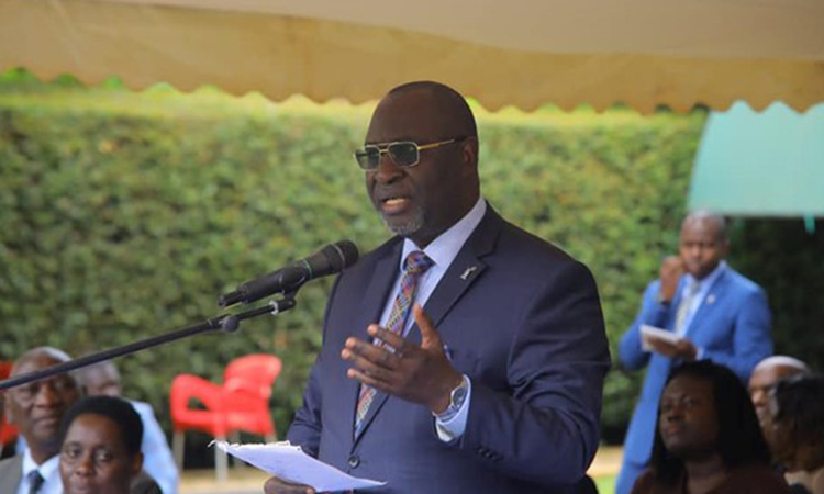 Hon. Robert Waggwa launching the CBS Pewosa investment plan Image