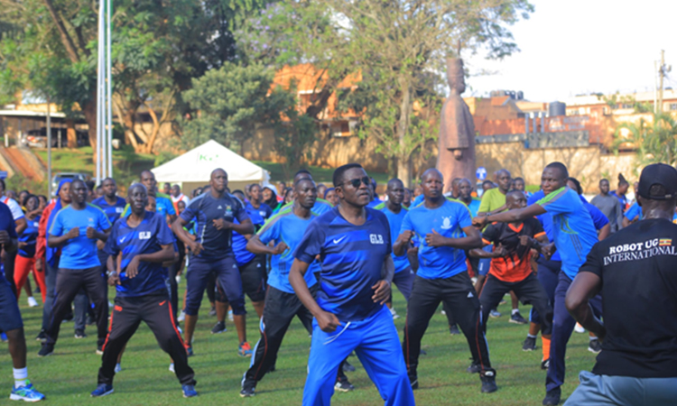 Katikkiro with other servants of the kingdom exercising Image
