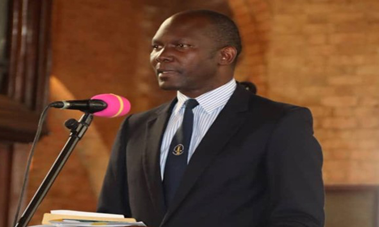 Hon. Noah Kiyimba at the Namirembe memorial service Image