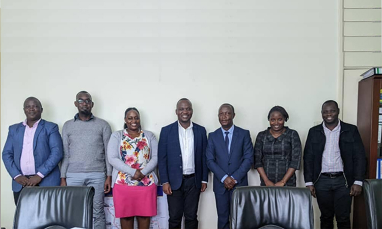 Hon.Robert Sserwanga, Minister of Youth, with the team from the Young Farmers Federation Image