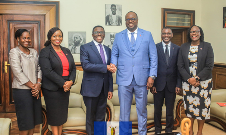 ABSA Bank chief executive officer (3rd right ) shaking hands with Katikkiro. Image