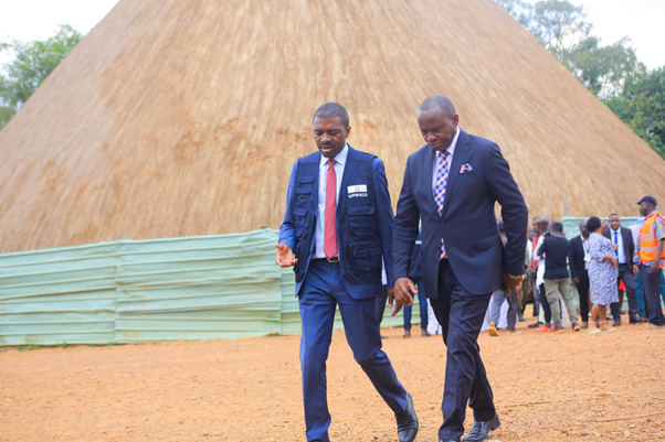 UNESCO Official Lazare Eloundou Assomo on left with minister Henry Sekabembe Kiberu in Kasubi tombs. Image
