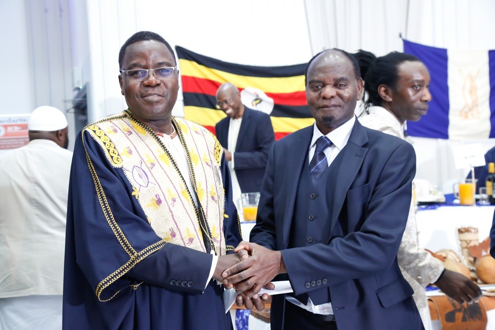 The previous and the current kabaka's representative Image